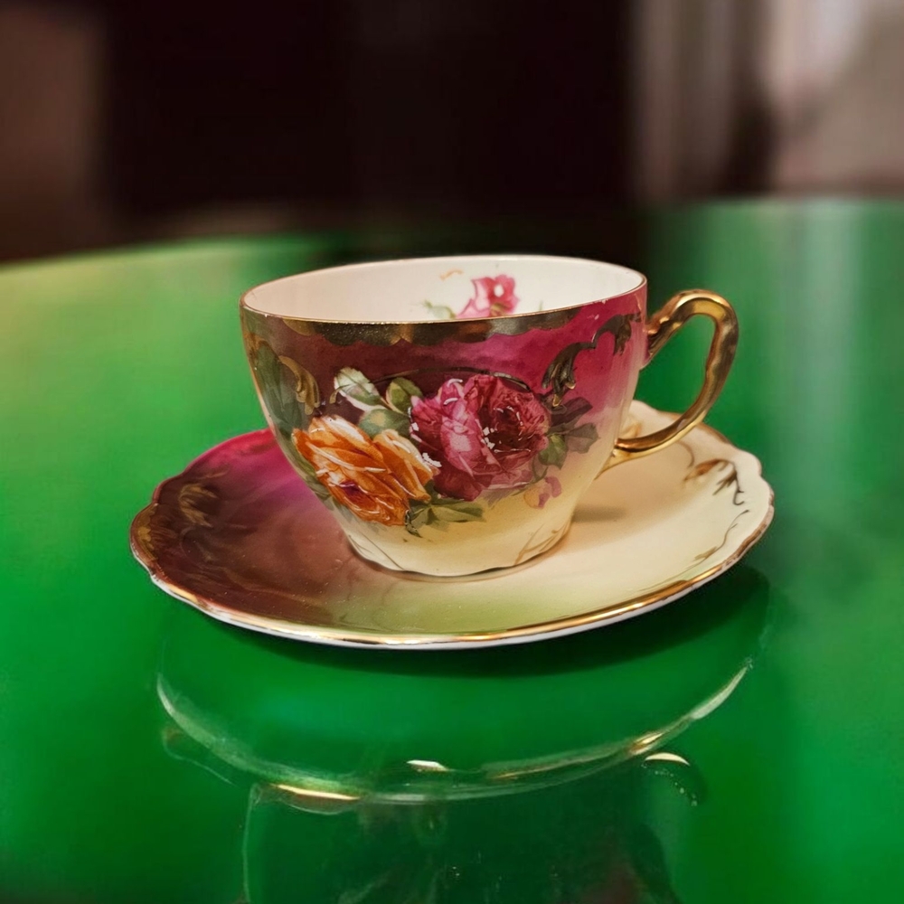 Vintage Floral Teacup and Saucer with Gold Handle